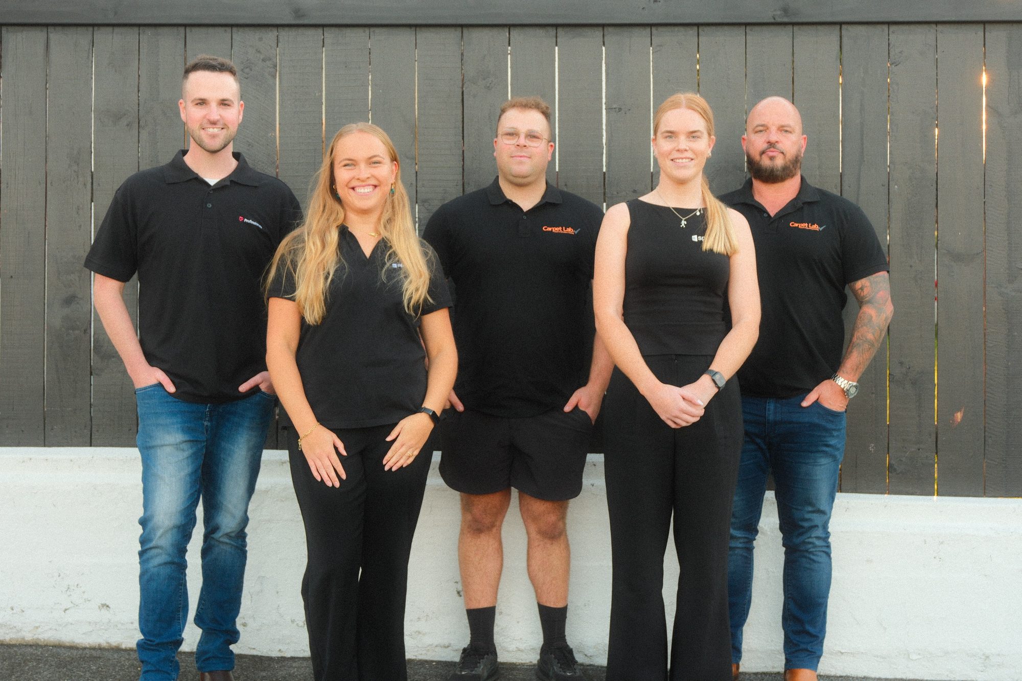 The five-person Carpet Lab and Meros team outside the Auckland office